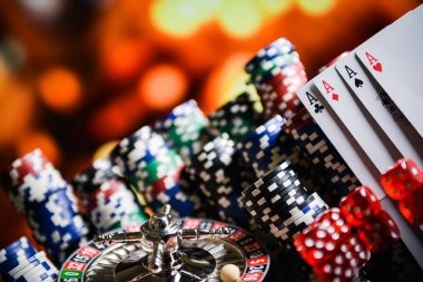Live dealer at baccarat table with multiple camera feeds showing card play